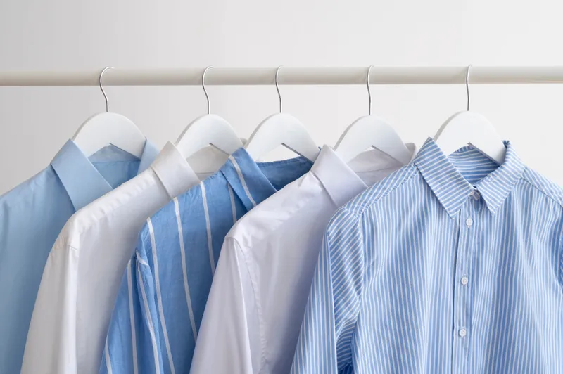 Pressed shirts displayed after specialist laundering